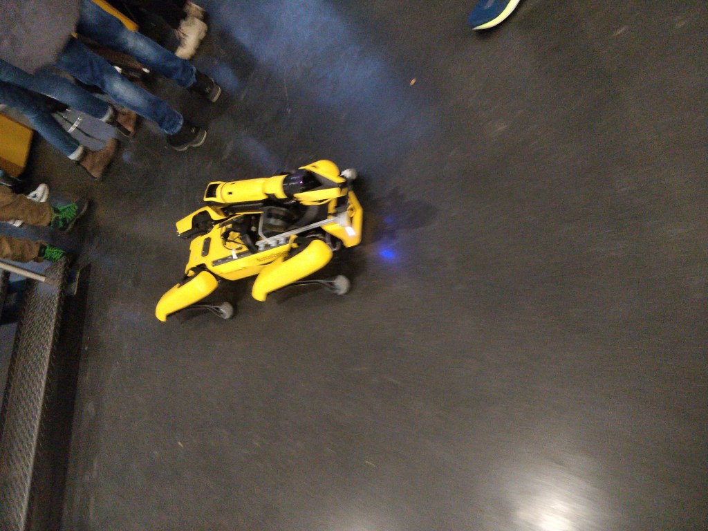 Boston Dynamics Spot robot viewed indoors from above