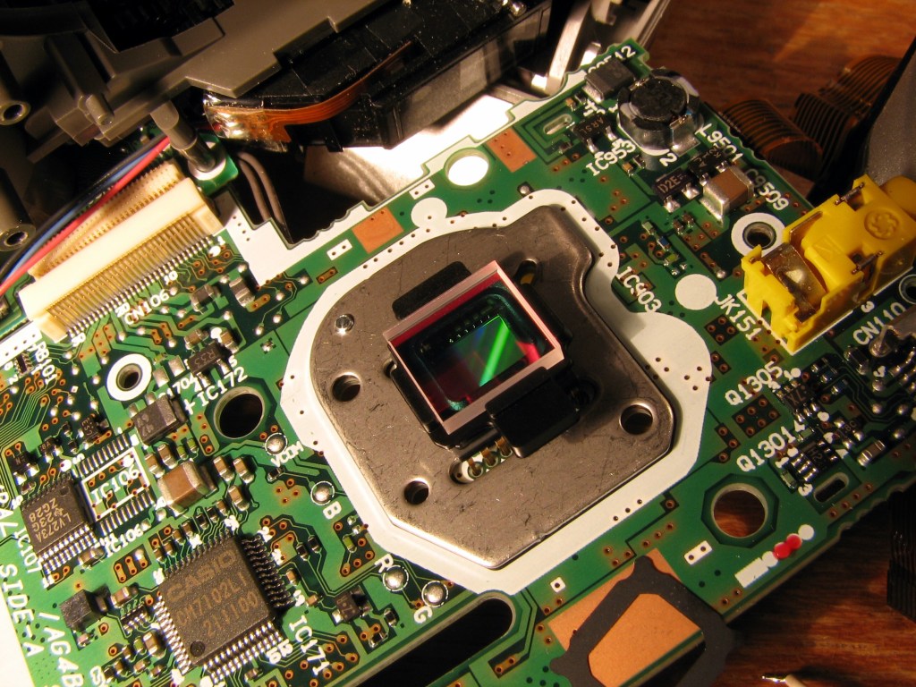 A digital camera image sensor exposed on its circuit board