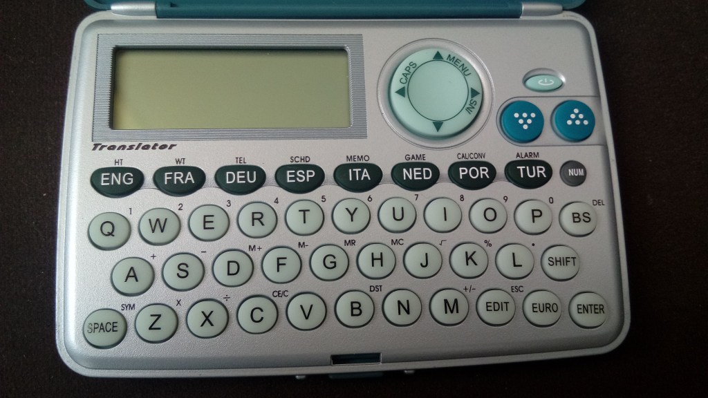 A dedicated electronic translation device with language-selection controls