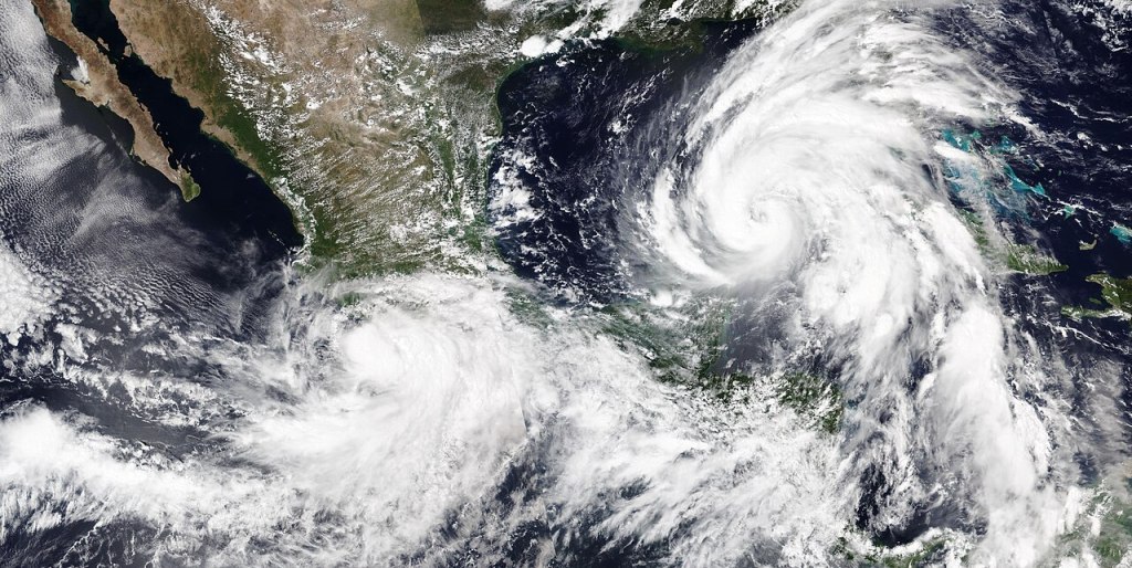 NASA satellite image showing Hurricane Helene and Tropical Storm John on September 25, 2024